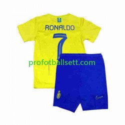 Fotballdrakt Al-Nassr Ronaldo 7 Barn Hjemmekit 2023-2024 Kortermet