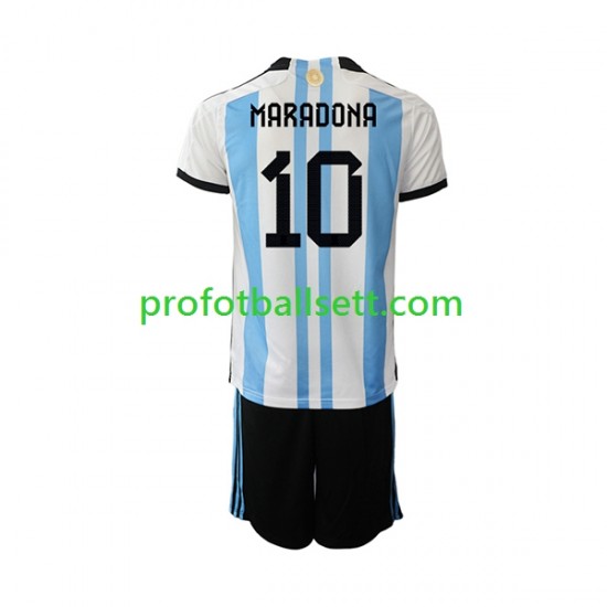 Fotballdrakt Argentina Maradona 10 Barn Hjemmekit VM 2022 Kortermet