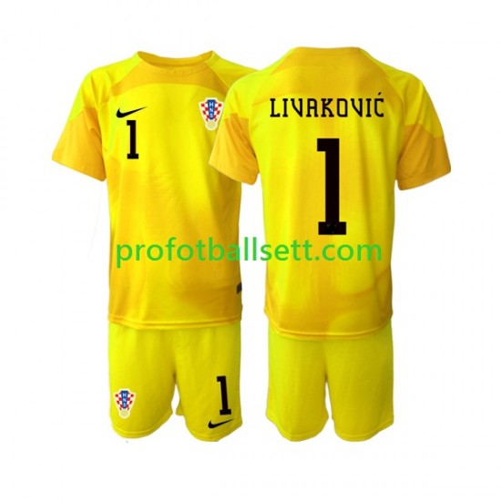 Fotballdrakt Kroatia Keeper Dominik Livakovic 1 Barn Hjemmekit VM 2022 Kortermet