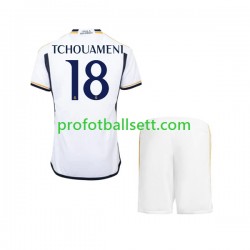 Fotballdrakt Real Madrid TCHOUAMENI 18 Barn Hjemmekit 2023-2024 Kortermet